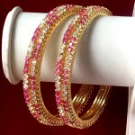 STYLE STATEMENT RUBY AD BANGLES IN GOLDEN POLISH