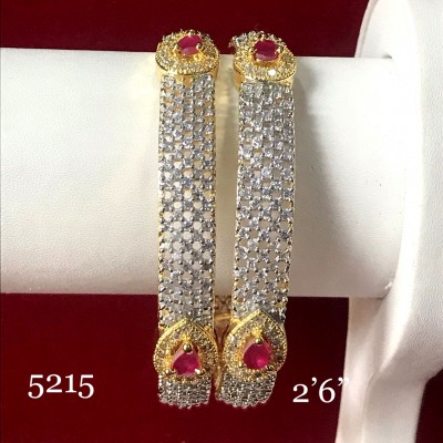 SUPER RICH CLASS BANGLES IN AD WITH RUBY COLOR STONE MAKE IN GOLDEN ALLOY