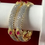 SUPER RICH CLASS BANGLES IN AD WITH RUBY COLOR STONE MAKE IN GOLDEN ALLOY