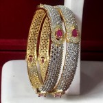 SUPER RICH CLASS BANGLES IN AD WITH RUBY COLOR STONE MAKE IN GOLDEN ALLOY