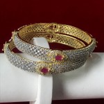SUPER RICH CLASS BANGLES IN AD WITH RUBY COLOR STONE MAKE IN GOLDEN ALLOY