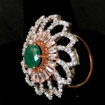 WHITE FLORAL SUPER RICH AD RING WITH EMERALD SOLITAIRE 