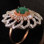 WHITE FLORAL SUPER RICH AD RING WITH EMERALD SOLITAIRE 