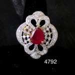 INDIAN WOMEN ENGAGMENT RING IN WHITE AD WITH RUBY SOLITAIRE