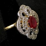 INDIAN WOMEN ENGAGMENT RING IN WHITE AD WITH RUBY SOLITAIRE
