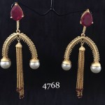 VERY STYLISH GOLDEN CURVE LONG EARRING WITH HANGING CHAIN AND RUBY PEAR 