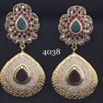 FUSION EARRING IN GOLDEN  ALLOY WITH WHITE AD AND RUBY STONE