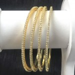 GOLDEN POLISH SLIM BANGLES IN TOP QUALITY AD STONES