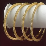 GOLDEN POLISH SLIM BANGLES IN TOP QUALITY AD STONES