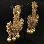 YELLOW GOLDEN WORK WITH CHAMPAGNE STONE AND PEARLS WEDDING EARRING