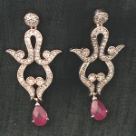 A Western Design Rose Gold Color Earring For Party wear..