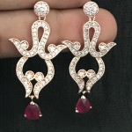 A Western Design Rose Gold Color Earring For Party wear..