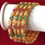 INDIAN TRADITIONAL MULTI COLOR STONE BANGLES IN GOLDEN ALLOY POLISH