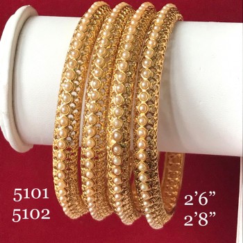 GOLDEN JALI HAND WORK WITH STUDDED PEARLS BANGLES