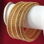 GOLDEN JALI HAND WORK WITH STUDDED PEARLS BANGLES