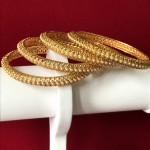 GOLDEN JALI HAND WORK WITH STUDDED PEARLS BANGLES