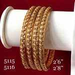 EXCLUSIVE PEARL BANGLES IN GOLDEN POLISH 